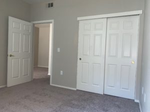 Elk Grove, CA Affordable Apartments - Geneva Pointe Bedroom with Plush Carpet and Large Closet